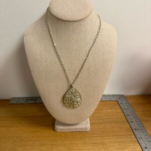 Intricate lattice metallic silver tone large pendant on double chain necklace